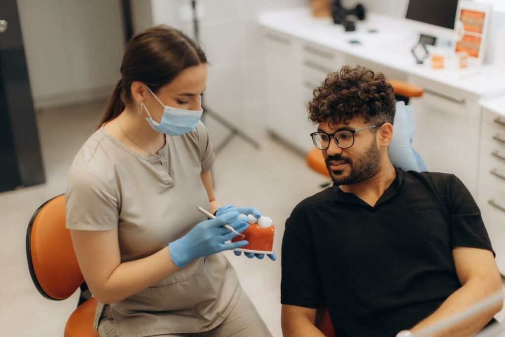 a person getting a dental crown at the dentist
